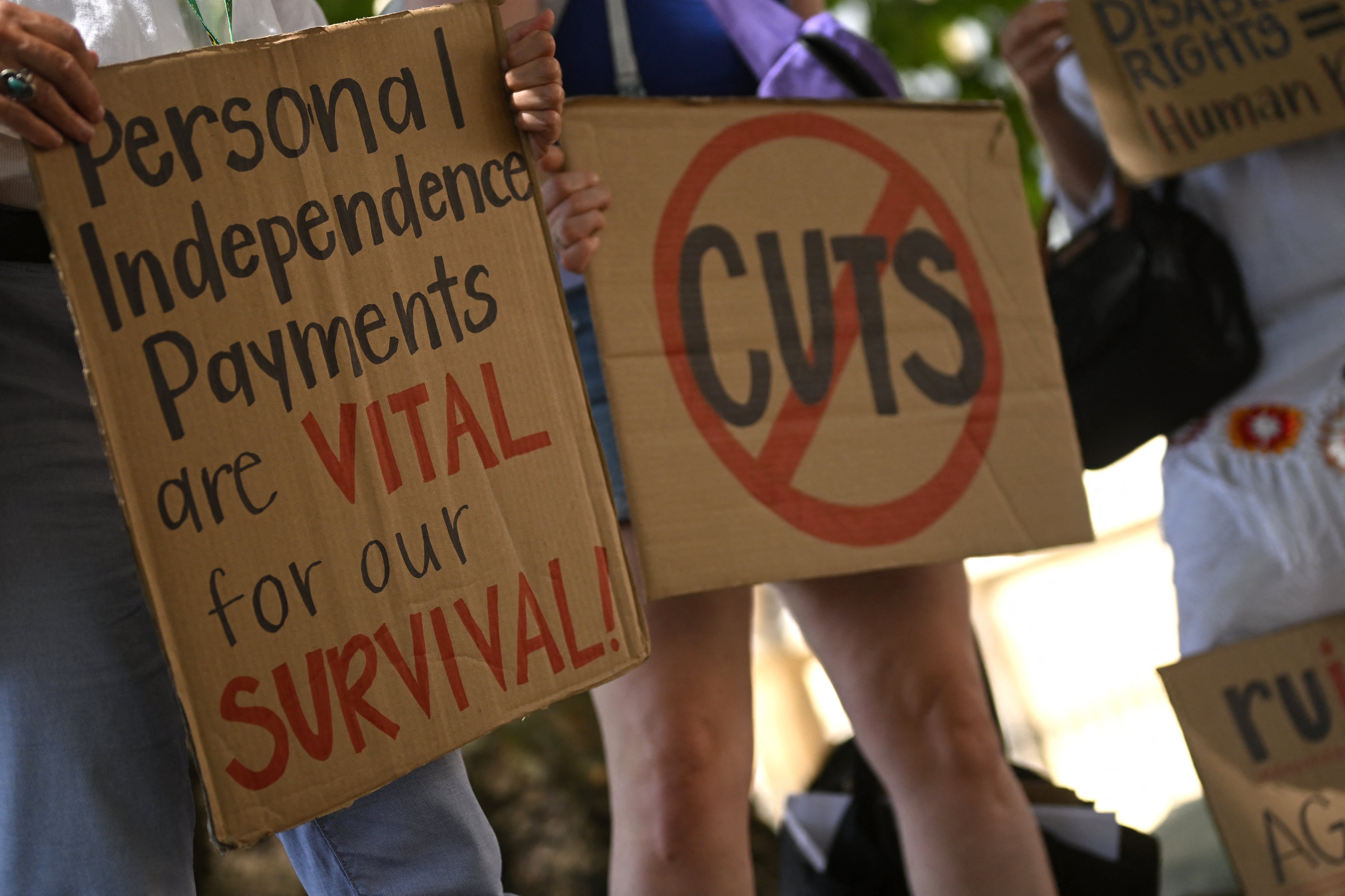 Protesters demonstrating against the proposed welfare reforms