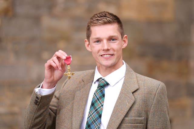 Swimmer Duncan Scott described the “special” moment he was made an OBE medal at a ceremony at the Palace of Holyroodhouse on Tuesday (Aaron Chown/PA)
