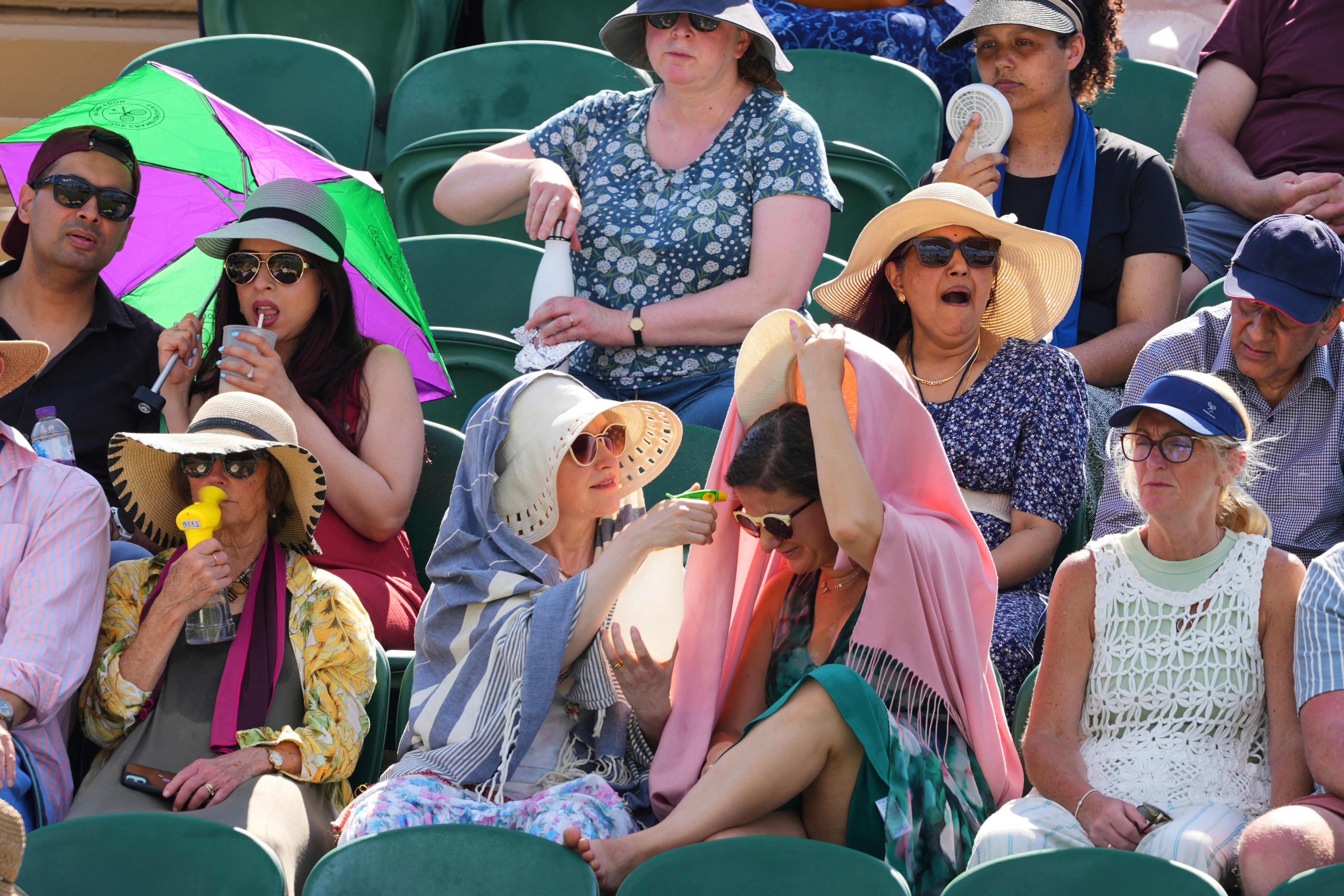 Britain Wimbledon Tennis Extreme Weather Heat