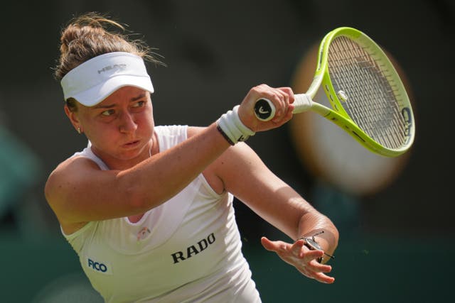 <p>Barbora Krejcikova of Czech Republic returns to Alexandra Eala of the Philippines during their first round women's singles match at the Wimbledon Tennis Championships </p>