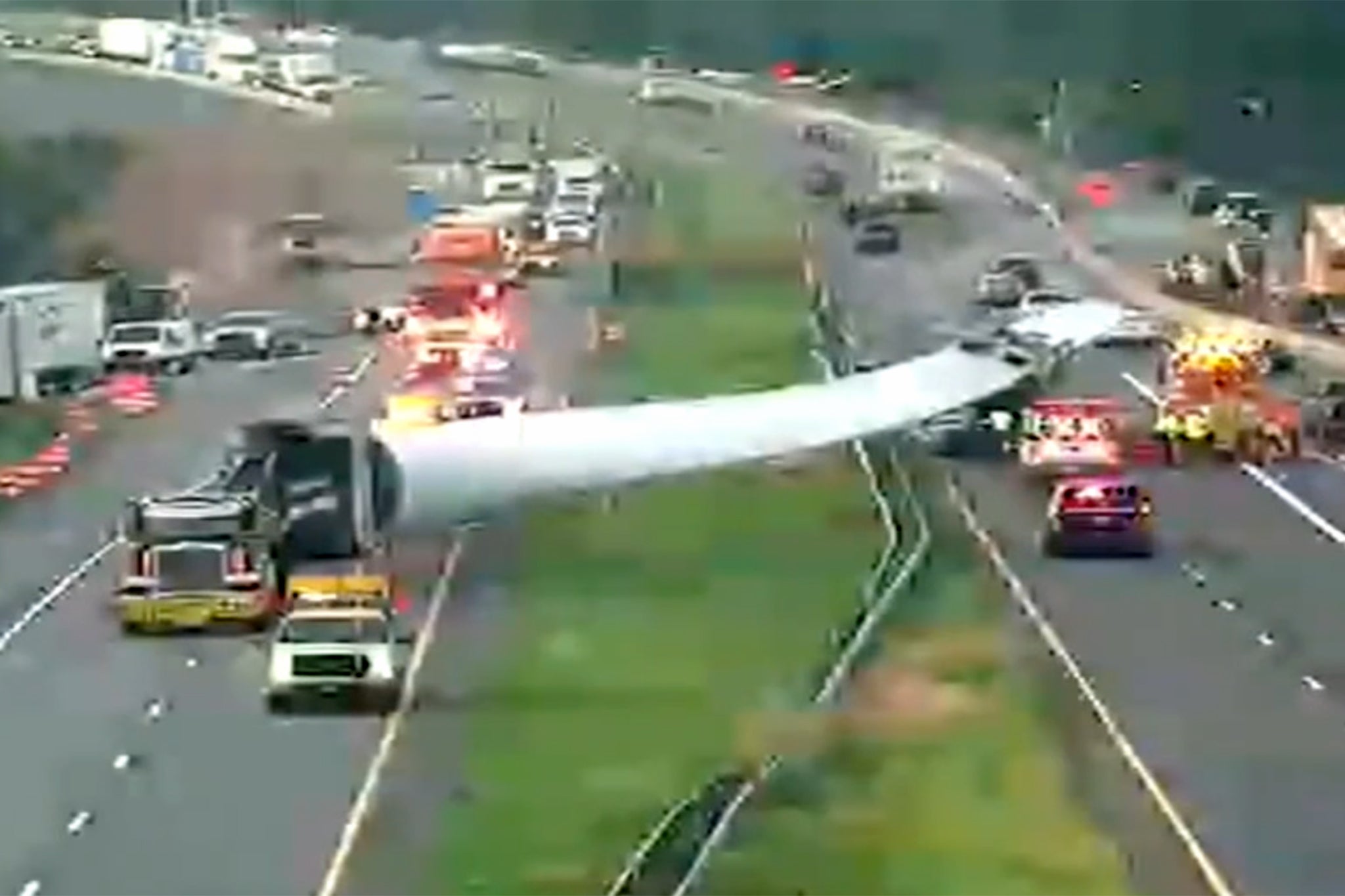 The truck-trailer collided with the guardrail forcing the blade to dislodge, say officials