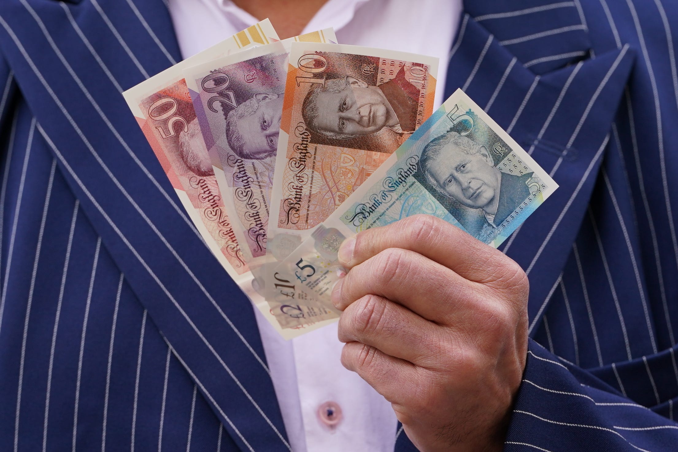 The Bank of England started issuing banknotes featuring a portrait of the King in June 2024 (Lucy North/PA)