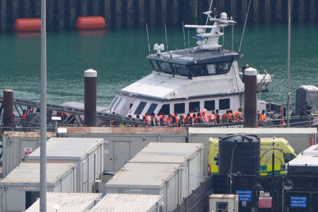 Some 879 migrants made the journey across the Channel in 13 boats on Monday (PA)