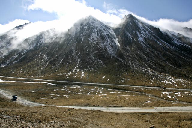<p>File. A truck passes along a road connecting to Mount Siguniang in China’s southwestern Sichuan province</p>