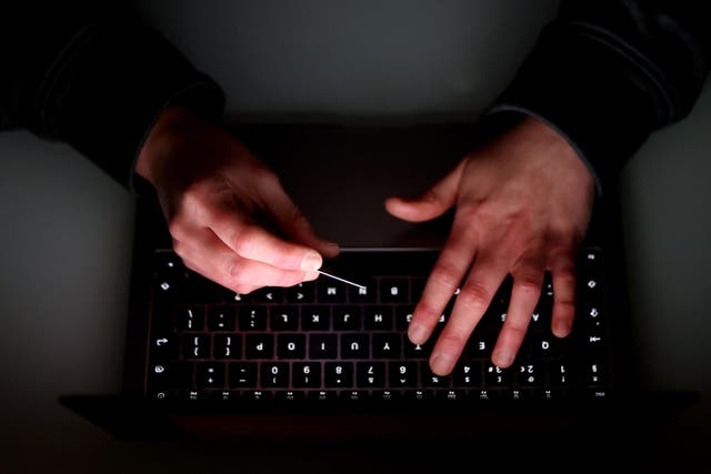 Scots are being urged to stay alert as online scams becomes more sophisticated (Tim Goode/PA)