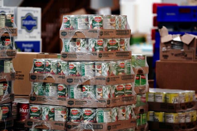 <p>Del Monte canned tomatoes are seen among other nonperishable goods inside the West CAP Food Pantry in Boyceville, Wisconsin</p>
