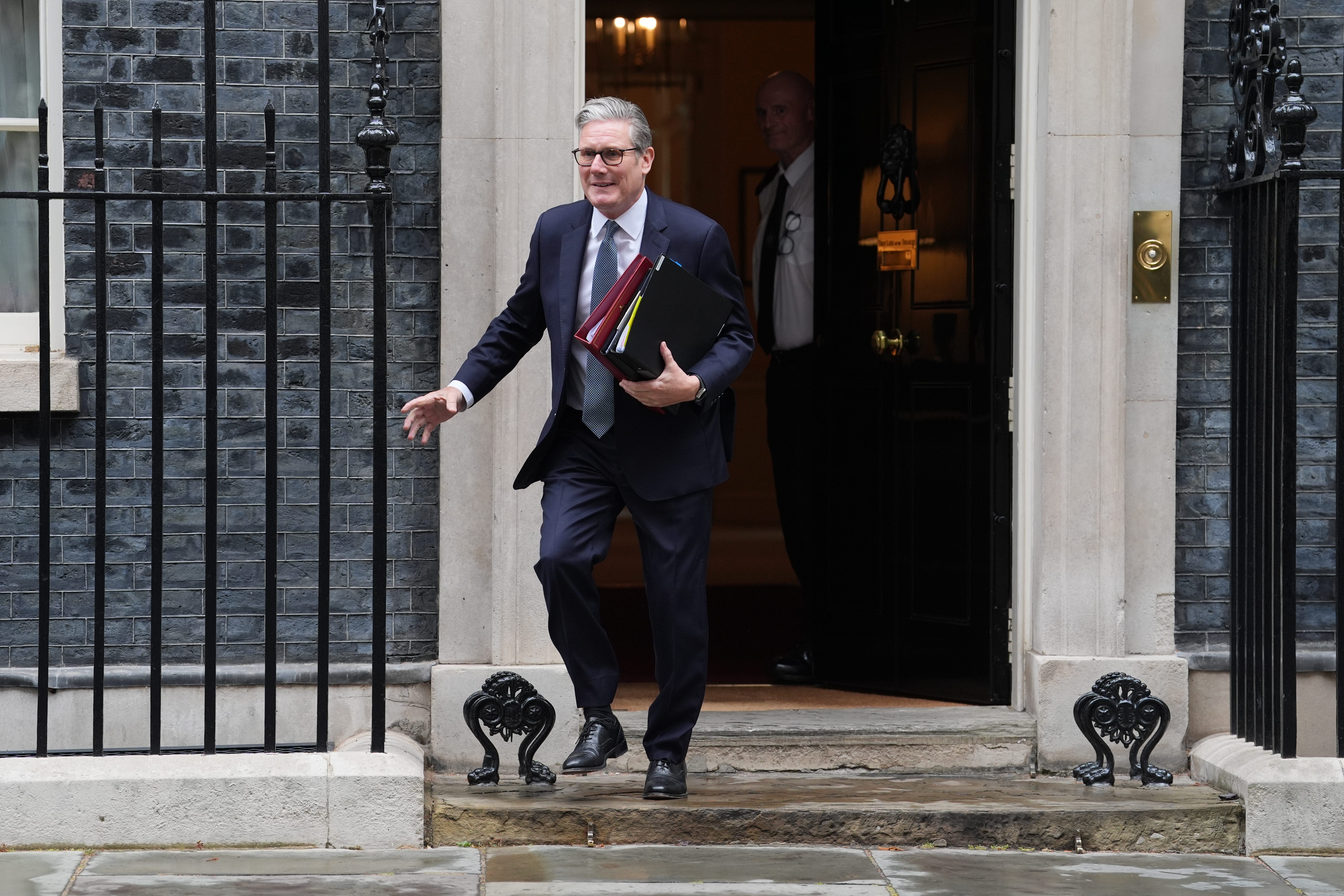 Prime Minister Sir Keir Starmer trips as he departs 10 Downing Street, London, to attend Prime Minister’s Questions at the Houses of Parliament (Lucy North/PA)