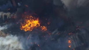 Aerial footage shows devastation after fireworks warehouse explosion