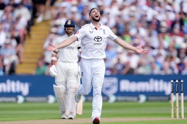 Chris Woakes celebrates the wicket of India’s KL Rahul (Martin Rickett/PA).