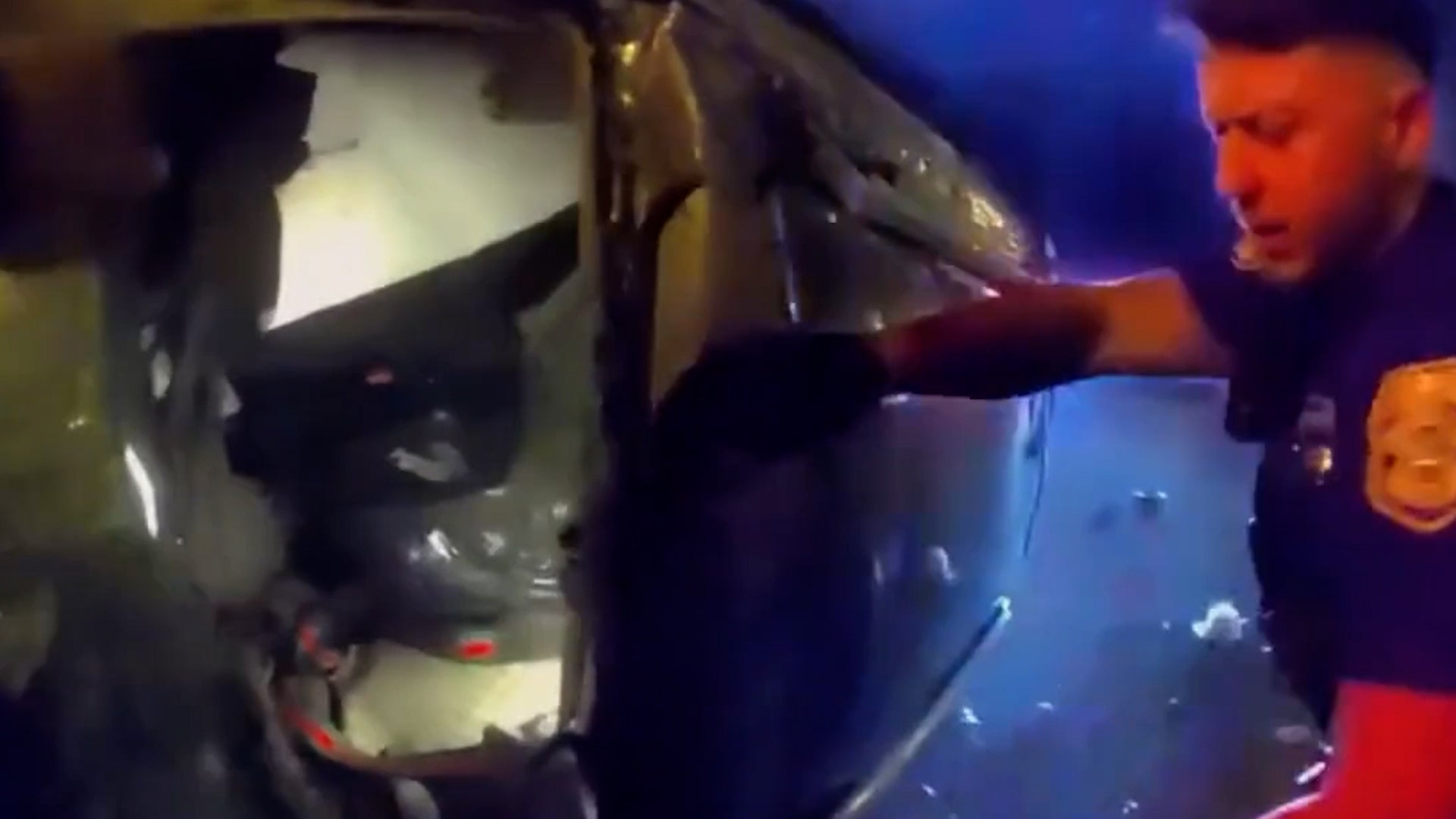 <p>Florida police smash through glass to rescue woman from fiery car wreck</p>