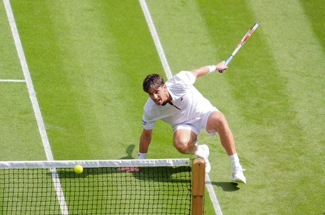 <p>Cameron Norrie left it all on the court (Adam Davy/PA)</p>