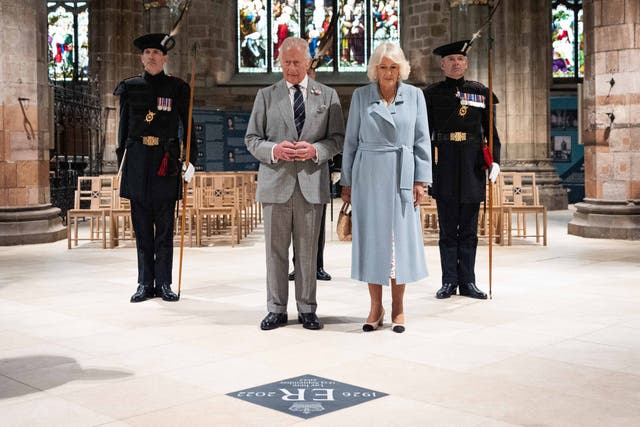 Charles and Camilla observed a moment’s silence at the unveiling of a memorial stone to Queen Elizabeth II at St Giles’ Cathedral in Edinburgh (Aaron Chown/PA)