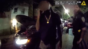 Moment man takes off running as police question him about stolen car