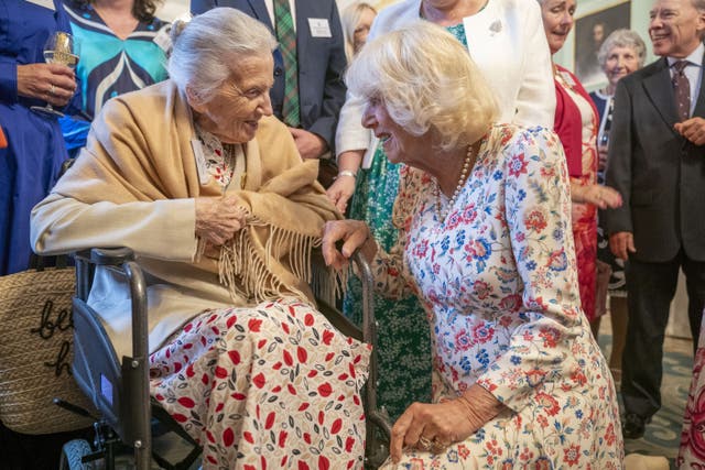 Queen Camilla met former and current nurses from the Queen’s Nursing Institute of Scotland at a reception at the Palace of Holyroodhouse on Wednesday (Jane Barlow/PA)