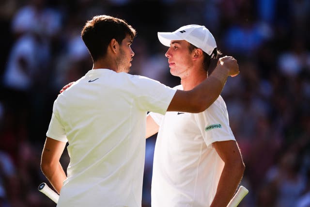 Oliver Tarvet, right, congratulates Carlos Alcaraz after their match (Mike Egerton/PA)