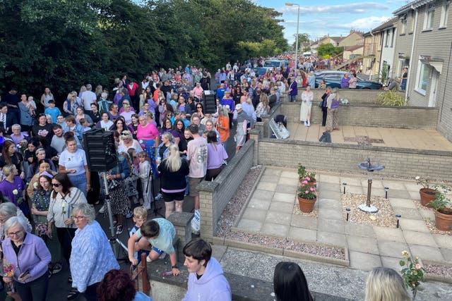 Hundreds of people gather in Donaghadee, Co Down, for a vigil in memory of Sarah Montgomery (Jonathan McCambridge/PA)