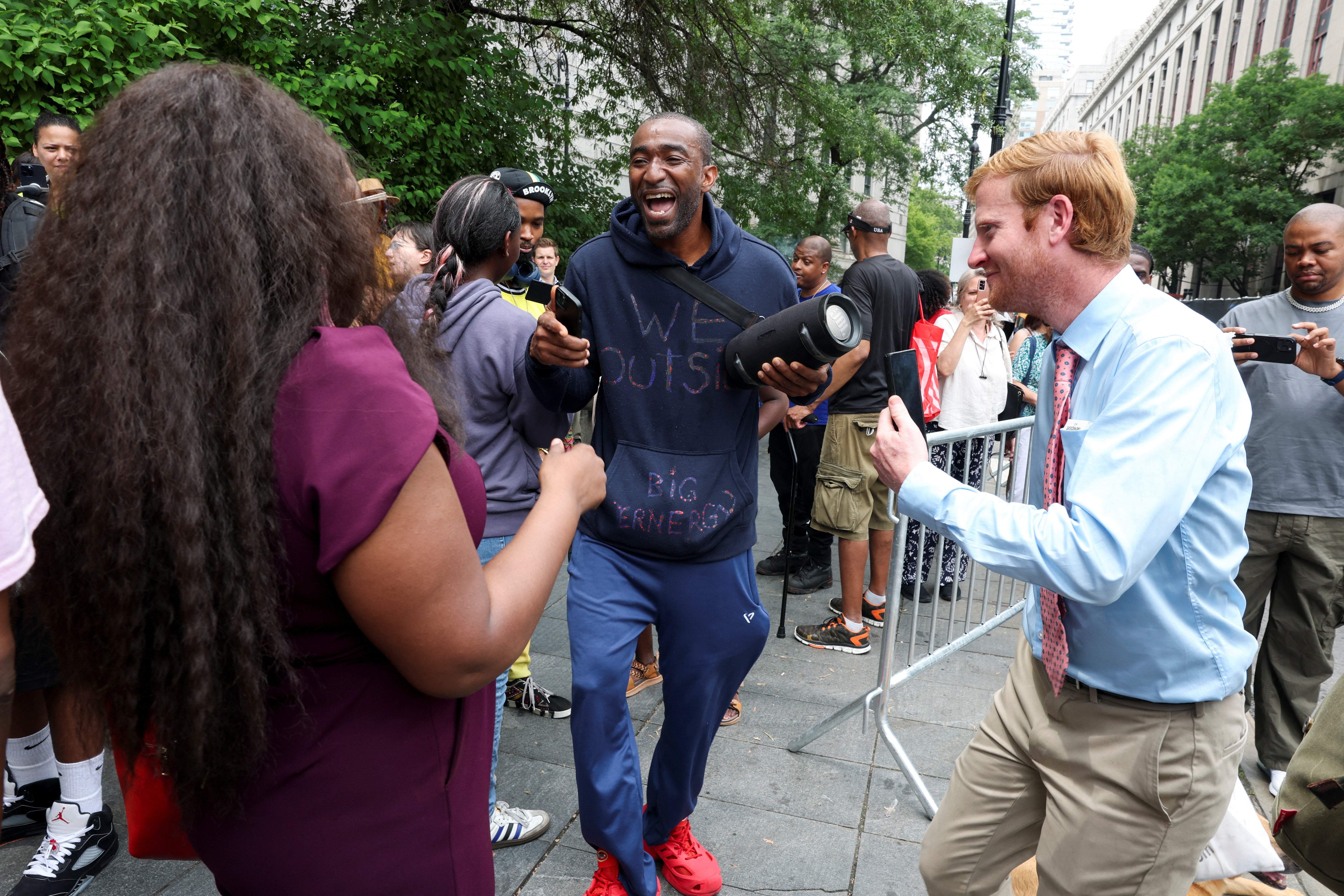 People danced and celebrated outside the Manhattan federal courthouse on Wednesday after the jury read their verdict