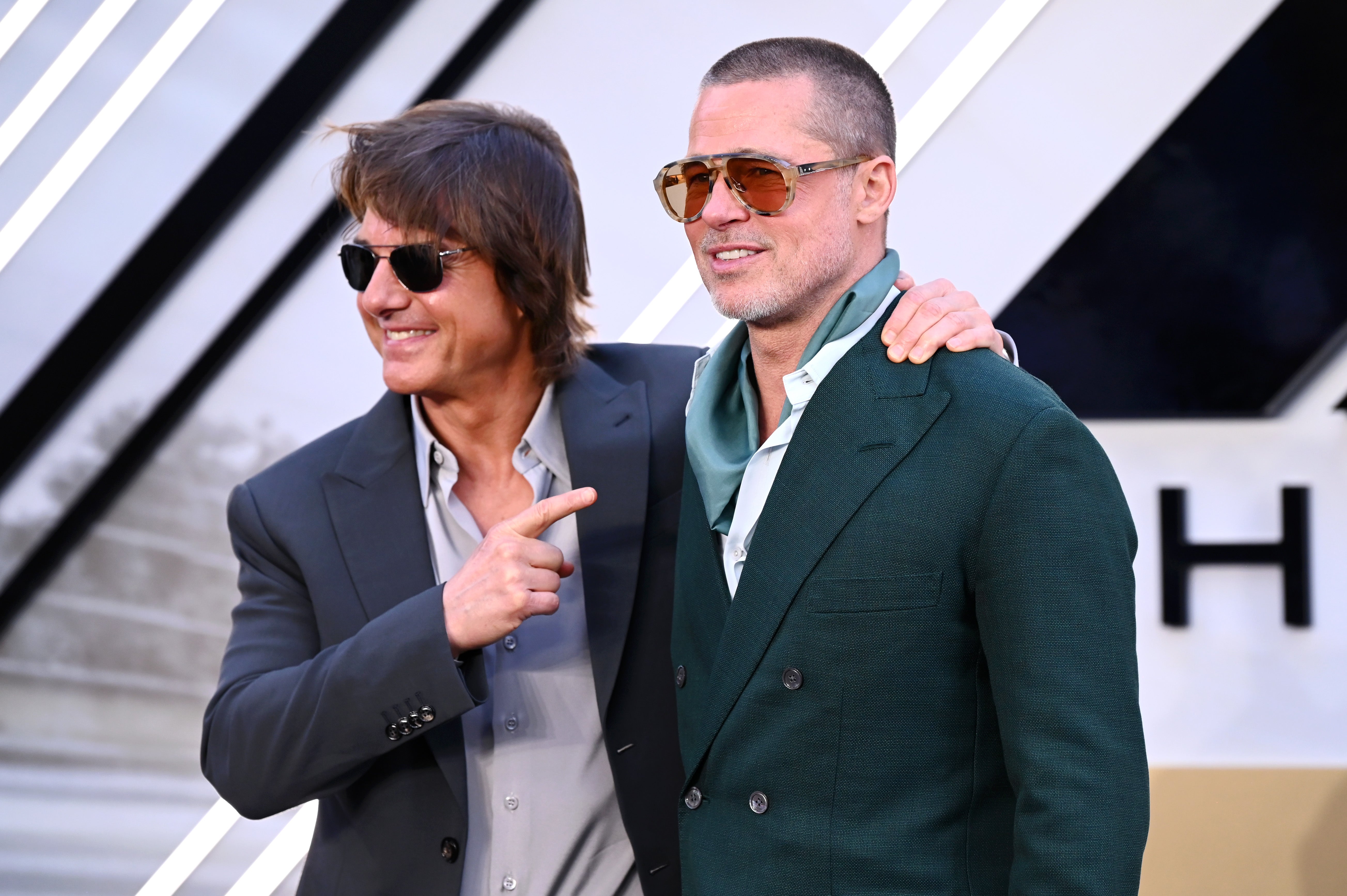 Cruise and Brad Pitt at the 'F1' premiere in London