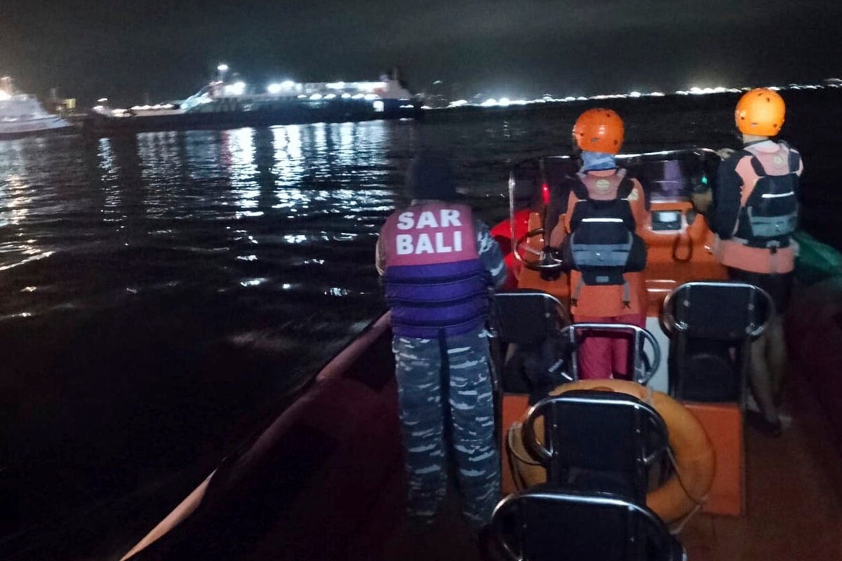 Rescuers search in rough seas for 43 missing after a ferry sank near Bali, Indonesia