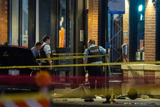 <p>The mass shooting outside a downtown Chicago nightclub has left at least 18 casualties, police say</p>
