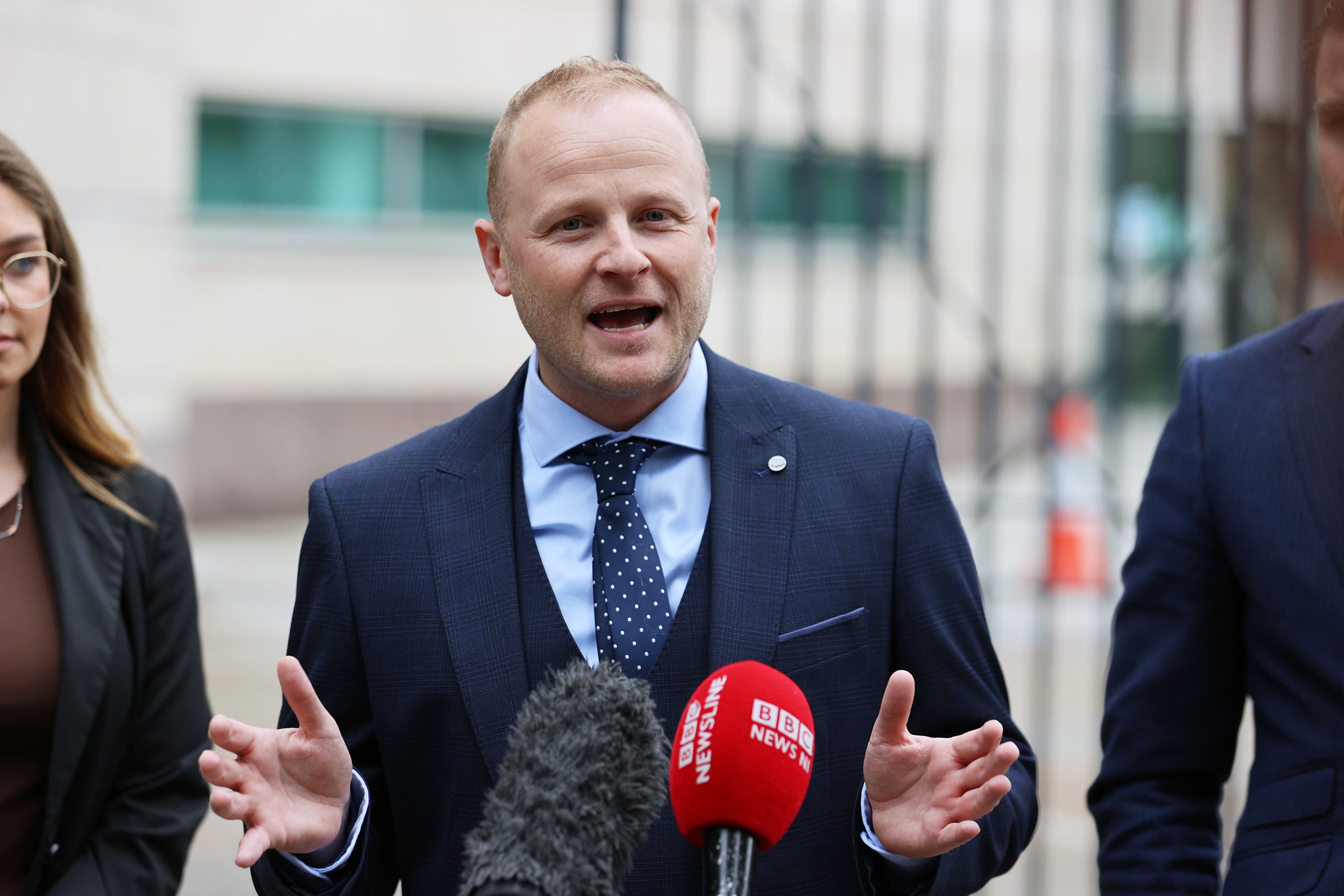 Jamie Bryson outside Belfast Crown Court after he, Thomas O’Hara and Daithi McKay were found not guilty (Liam McBurney/PA)