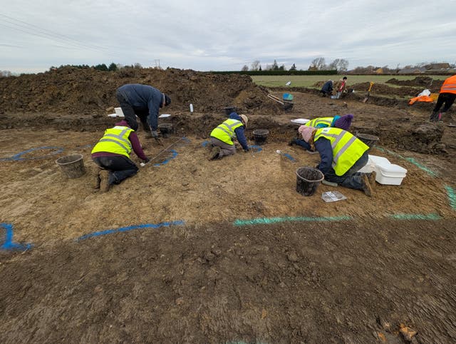 <p>Volunteers at work during an excavation near a Cotswolds village</p>
