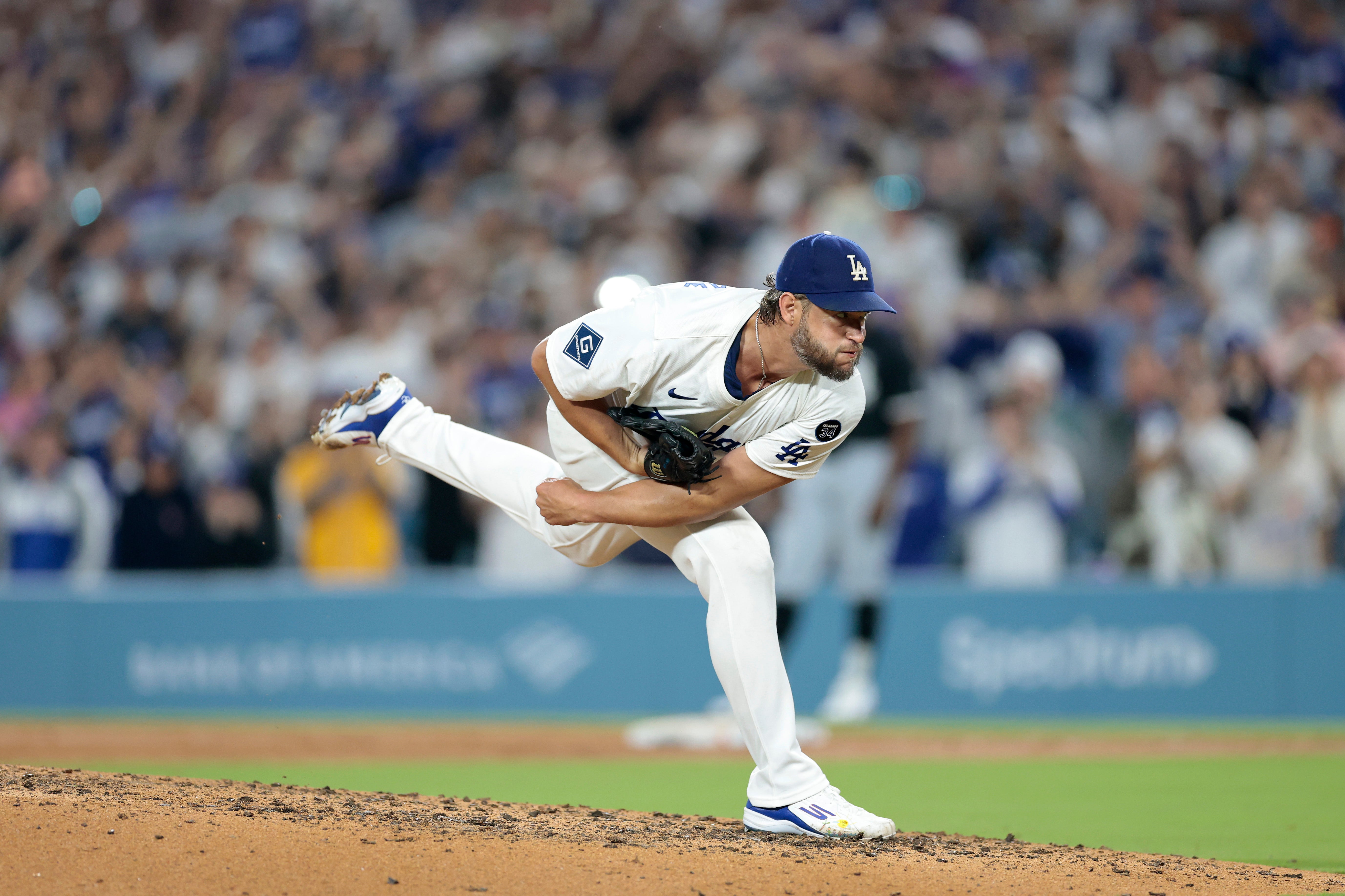 <p>Clayton Kershaw, #22 of the Los Angeles Dodgers, strikes out Vinny Capra, #41 of the Chicago White Sox, during the sixth inning to record his 3,000th career strikeout</p>