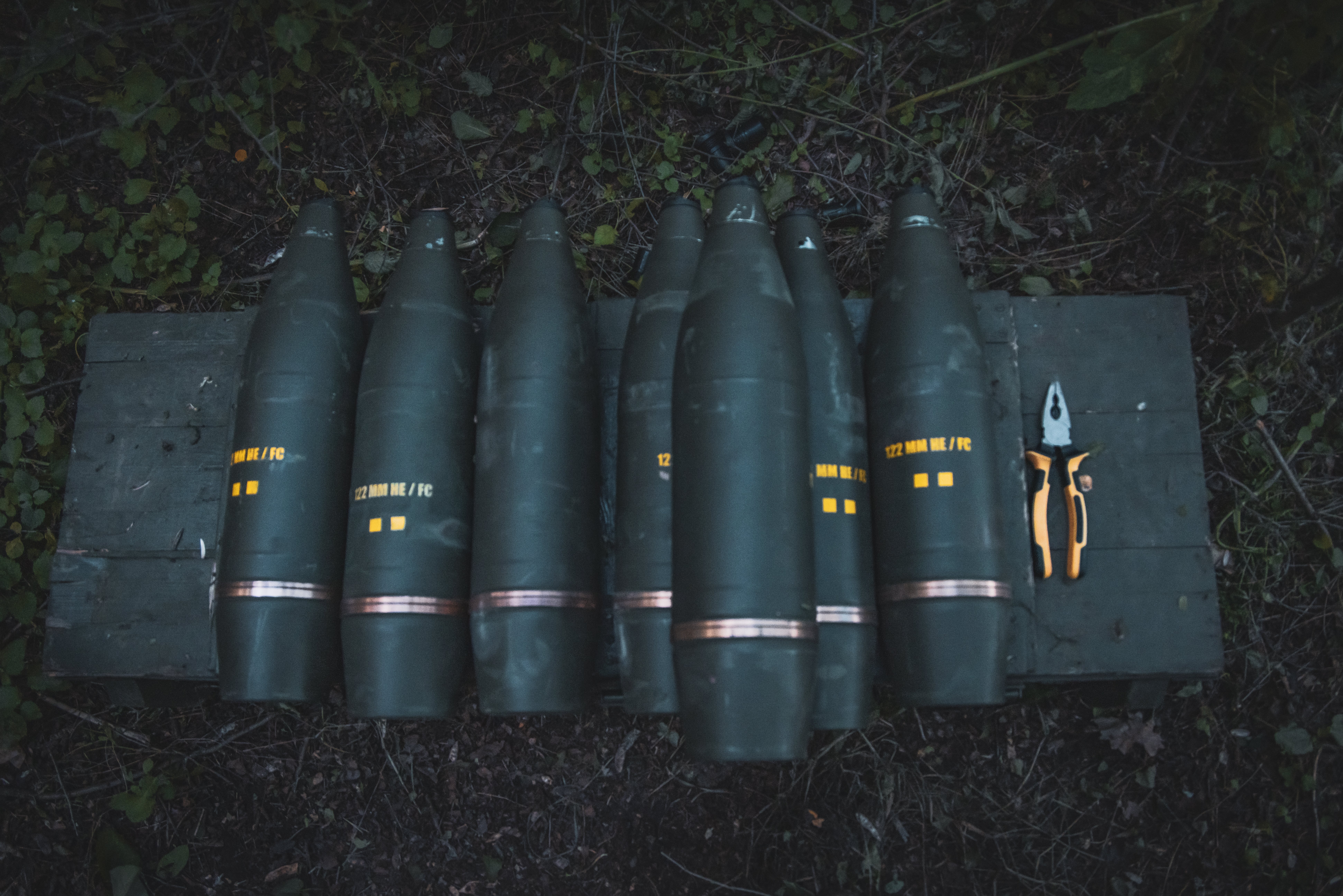 Projectiles used by the artillery unit for combat work as Ukrainian forces with the 117th territorial defense brigade operate an artillery position in the Sumy region