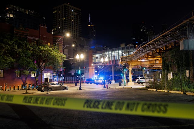 <p>At least four people were killed and 14 others were injured in a drive-by shooting in Chicago Wednesday night, authorities said. </p>