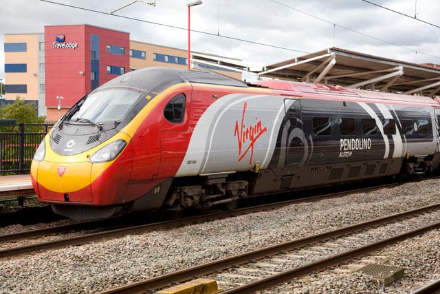<p>A Virgin train on the west coast mainline in 2012</p>