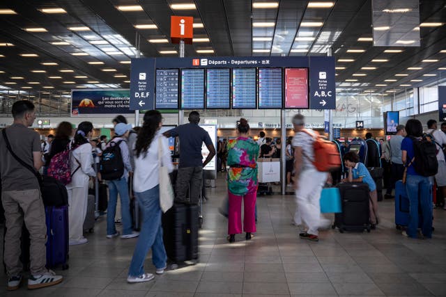 <p>Passengers at a French airport during the air traffic control strikes in summer</p>