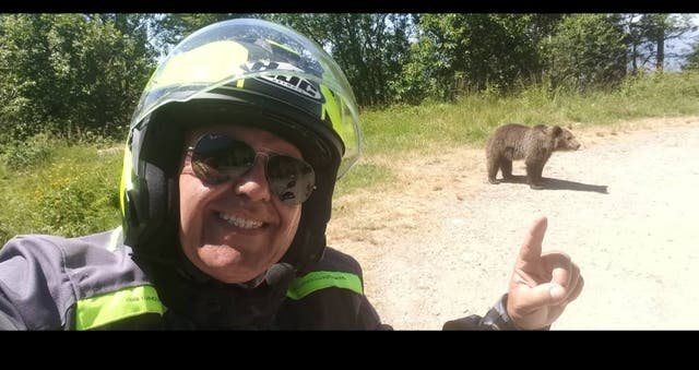 <p>Photo of Omar Farang Zin with a bear in Romania, posted a day before he was killed by one</p>