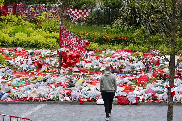 <p>Tributes to Jota outside Anfield on Friday</p>