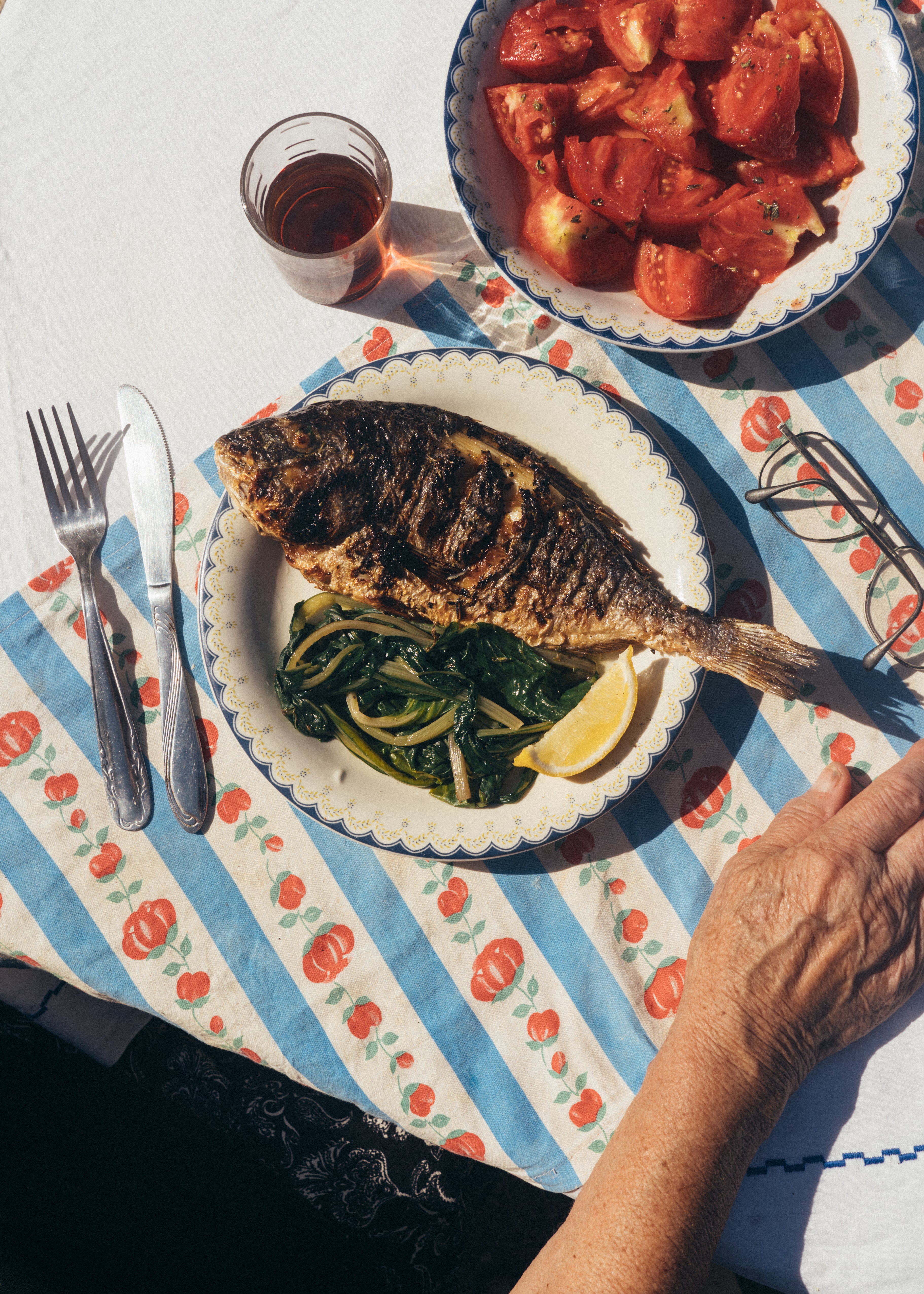 Grilled seabream with steamed greens and Corfiot tomatoes are a favourite dish of cookbook author and writer Anastasia Miari
