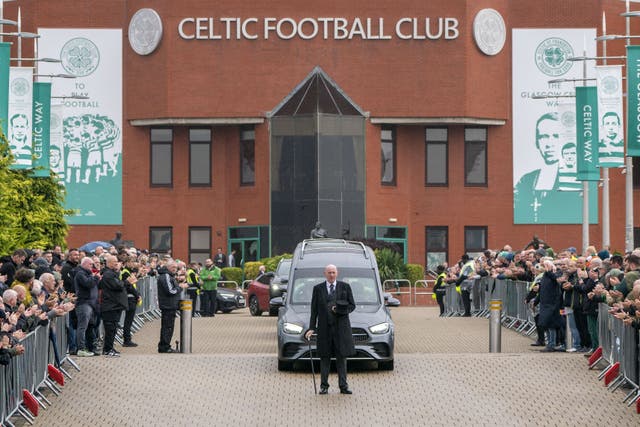 The funeral cortege for John Clark passes Celtic Park stadium following a requiem mass held at St Mary’s Church, Glasgow (Jane Barlow/PA)