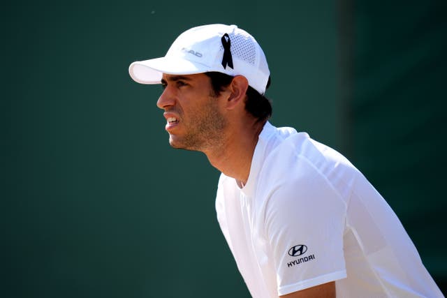 Nuno Borges of Portugal, wearing a black ribbon in his hat (John Walton/PA)