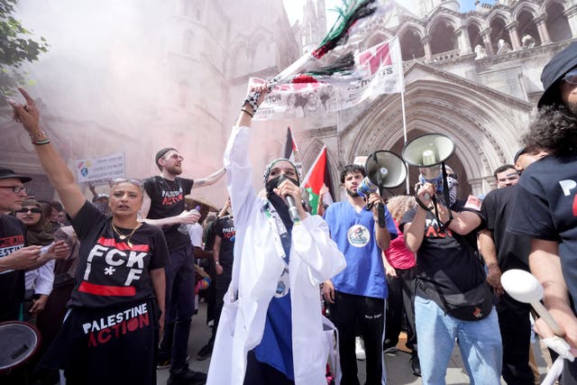 Protesters outside the Royal Courts of Justice on The Strand, central London, ahead of a hearing over whether proscribing of Palestine Action should be temporarily blocked (Lucy North/PA)