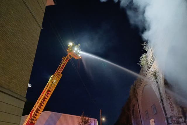 <p>Firefighters battling a blaze on Roxeth Green Avenue in South Harrow</p>