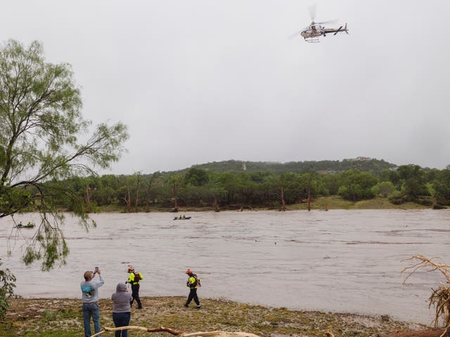 <p>A helicopter searches the Guadalupe River in Texas for survivors after a severe flood event in July 2025. A drone operator in the area hit a helicopter with their remote vehicle, forcing the helicopter to land for repairs</p>