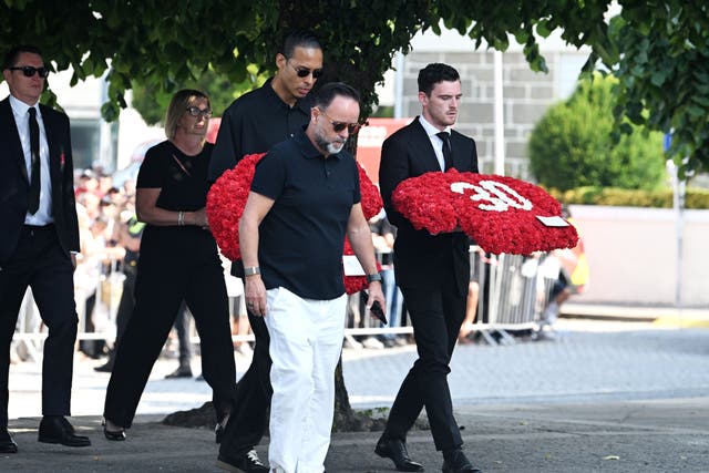 Liverpool’s Virgil Van Dijk and Andy Robertson arrive at the funeral of Diogo Jota and Andre Silva (PA)