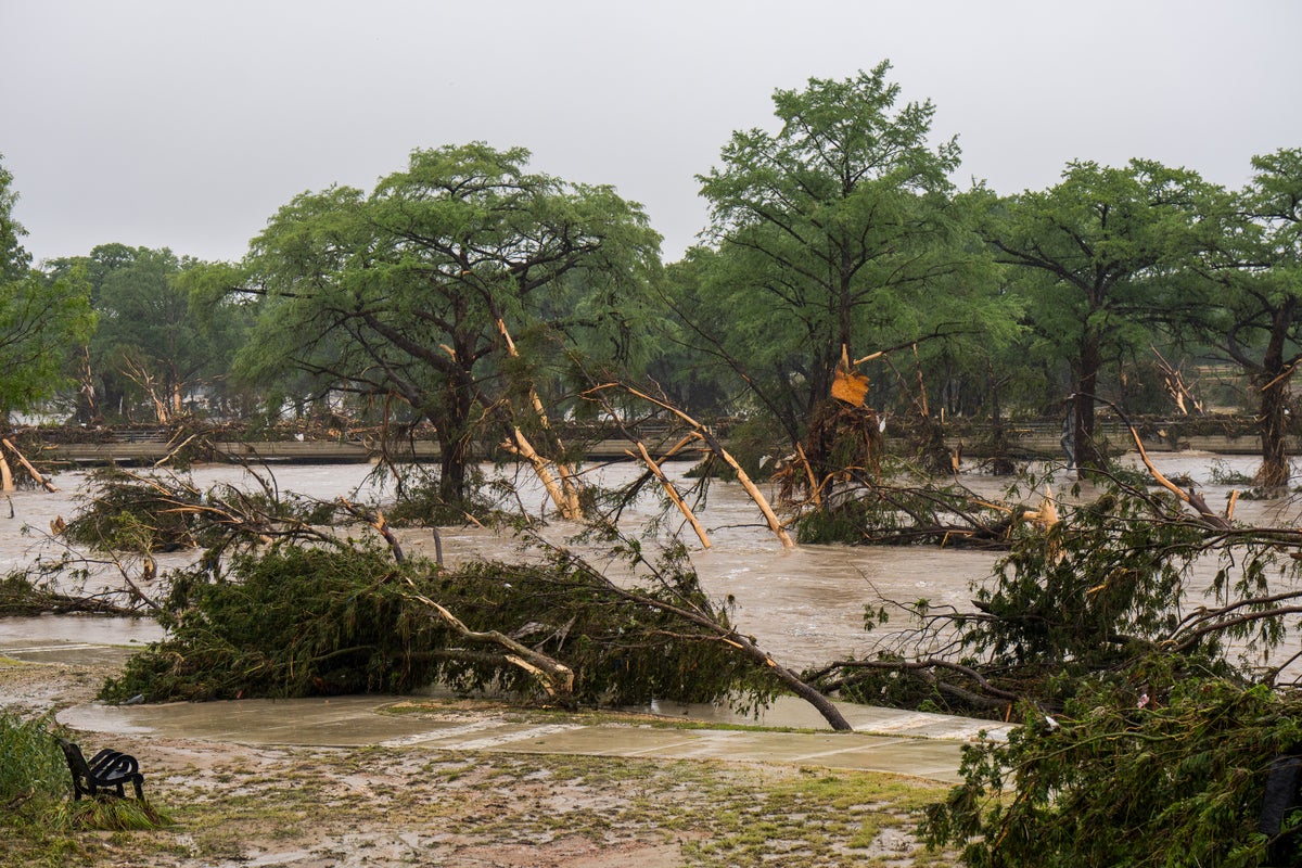 Texas flooding latest: 14 children among 32 dead while frantic search continues for missing summer camp girls