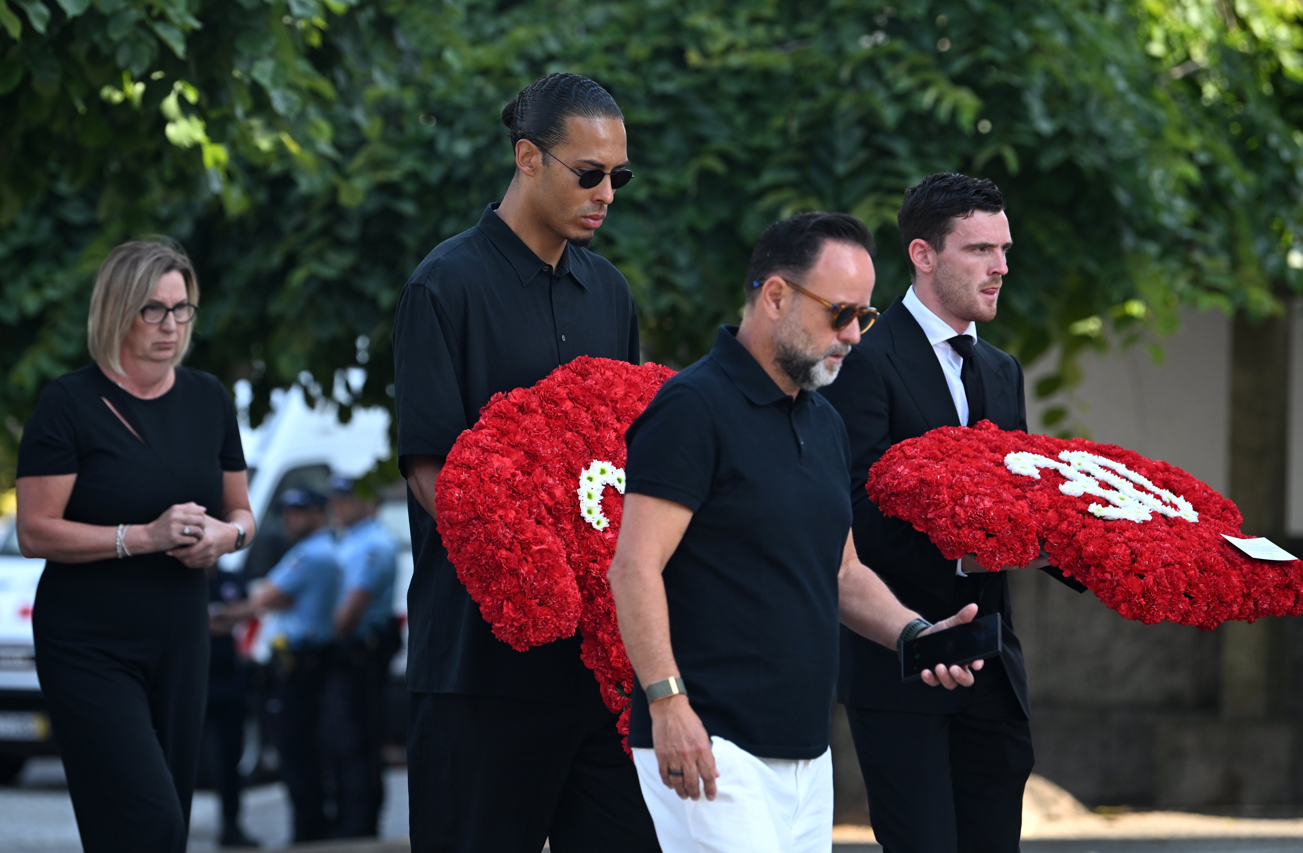 Liverpool's Virgin Van Dijk and Andy Robertson arrive at the funeral of Diogo Jota and Andre Silva who are held in the Church of Mother Gondomar in Gondomar near Porto