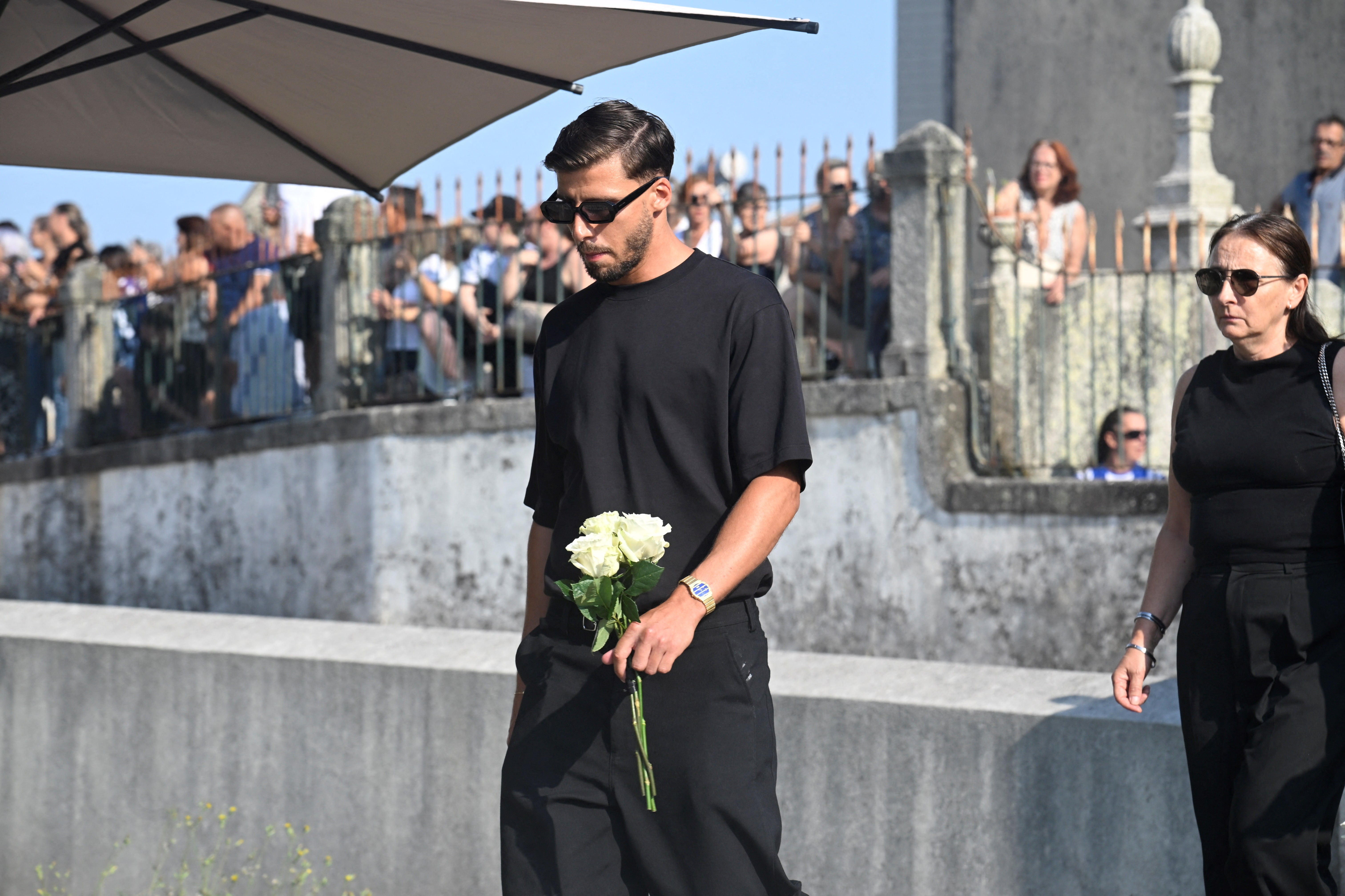 Football player Manchester City Ruben Dias, Jota's national teammate, arrives at the service