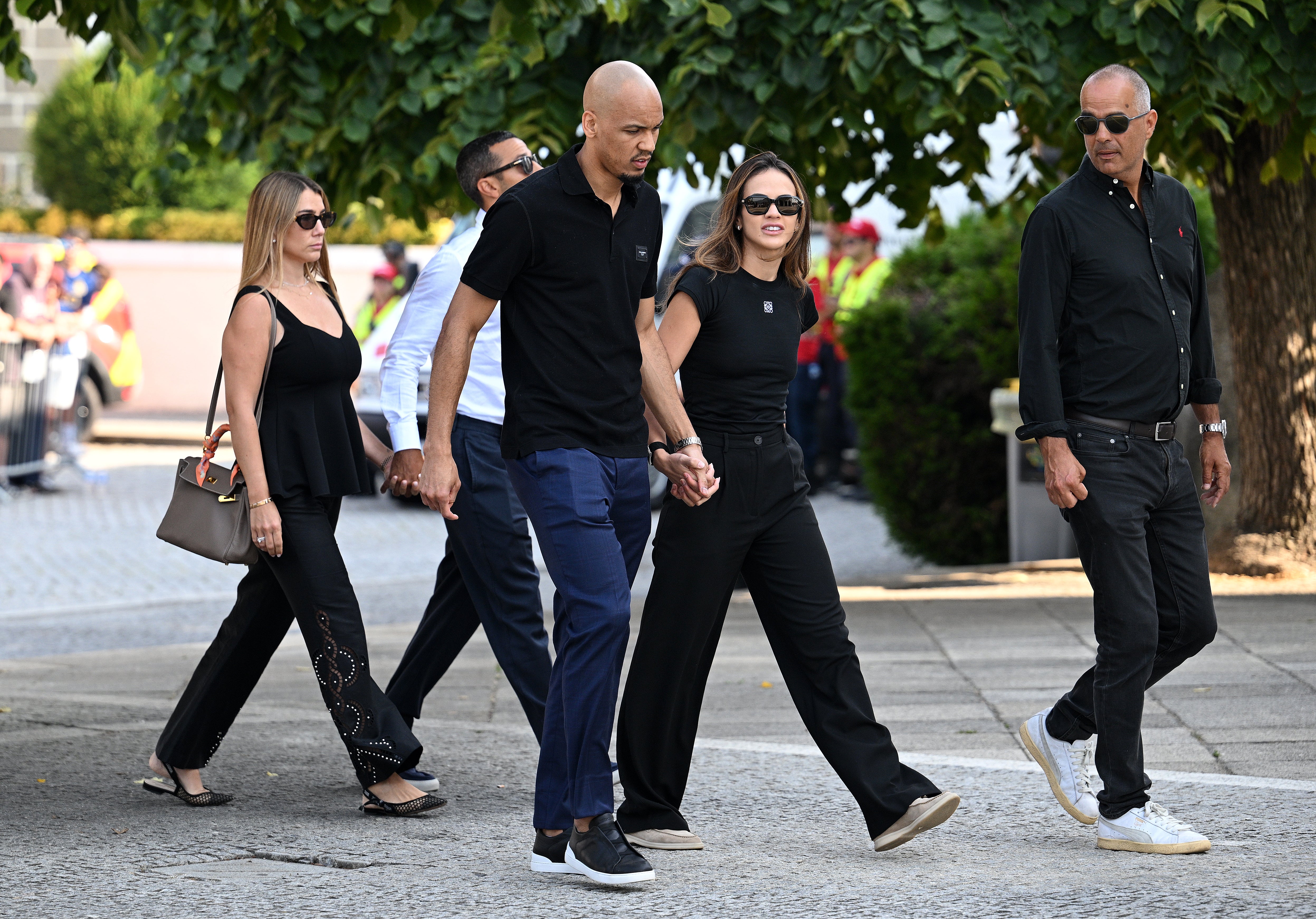 Thiago Alcantara, former football player and his wife Julia Vigas arrive with Fabinh