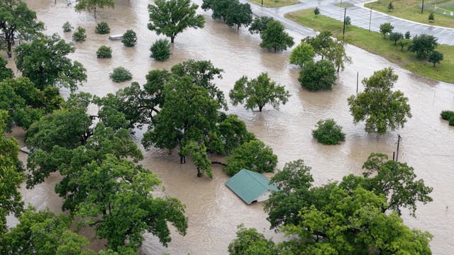 <p>A drone view shows an area flooded by the swollen San Gabriel river, in Georgetown, Texas</p>