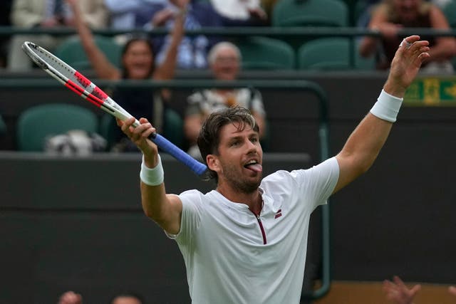 <p>Cameron Norrie celebrates his win on No 1 court on Sunday</p>