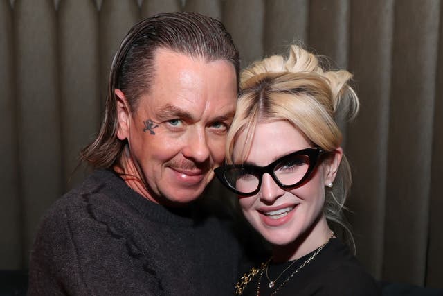<p>Sid Wilson alongside his fiancée Kelly Osbourne </p>