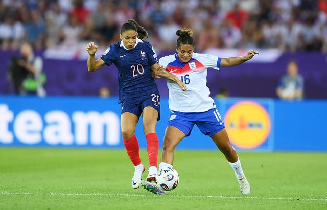 <p>Jess Carter of England is challenged by Delphine Cascarino of France during the UEFA Women's EURO 2025 Group D match between France and England</p>