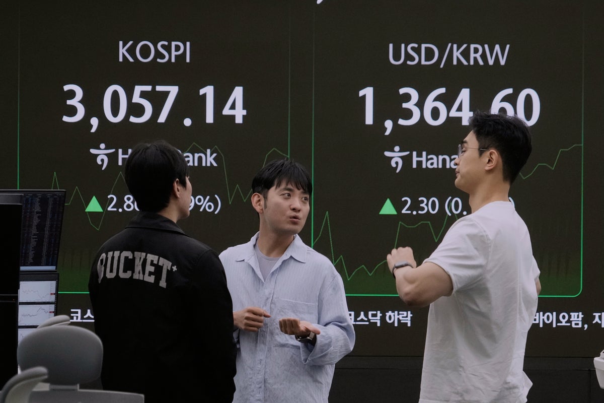 Asian shares are mostly down as Trump’s tariff deadline looms and pressure steps up