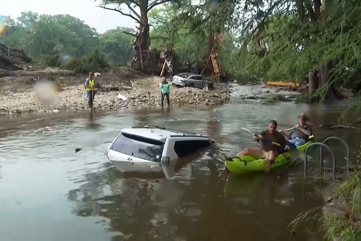 Families sift through debris and begin cleanup as Texas flood death toll rises